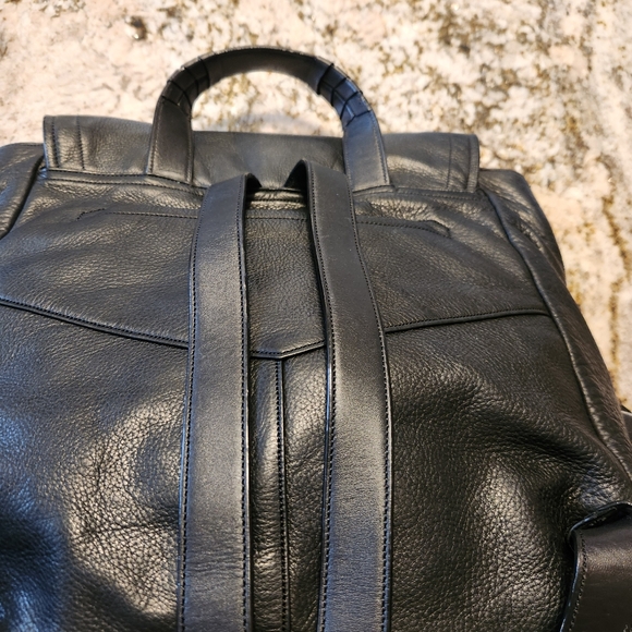 cole haan felicity leather backpack Mini Drawstring Magnetic flap closure with buckle detail Cole haan backpack leather -